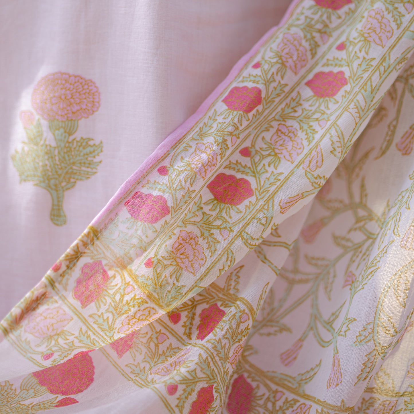 Pink Floral Kurta Set with Fishcut Bottom and Soft Mulmul Dupatta
